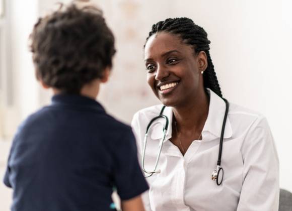 Child with medical professional.